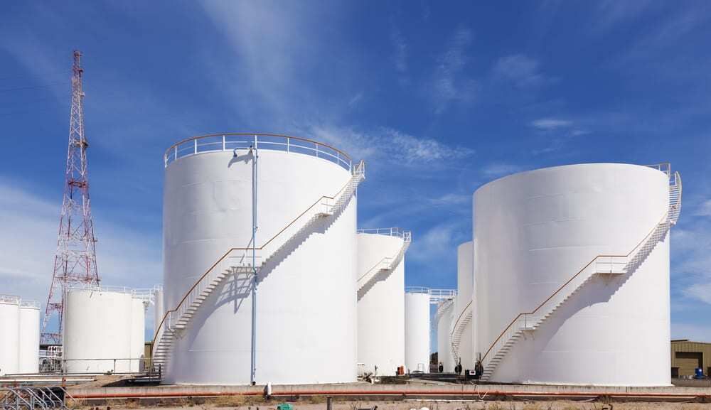 Fuel storage tanks against blue sky